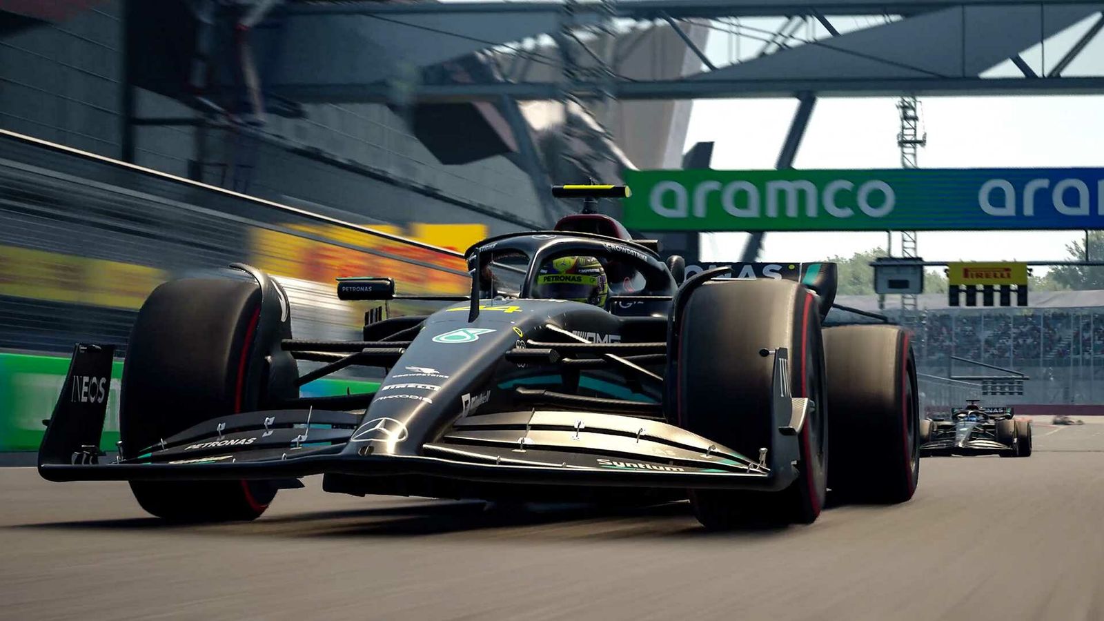 A black Mercedes F1 car on a track.