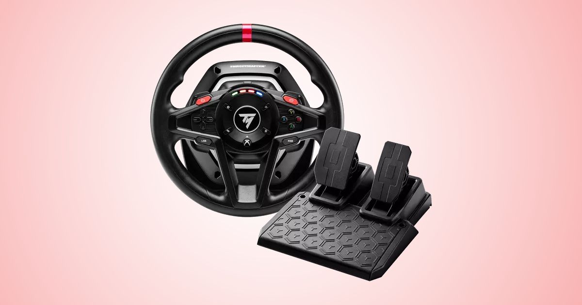 A black racing wheel with a red centre line at the top, with the entire wheel sat next to a black two-pedal set.