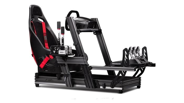 Best racing seat for F1 23 - Next Level Racing F-GT Elite Cockpit product image of a  black and red racing rig.