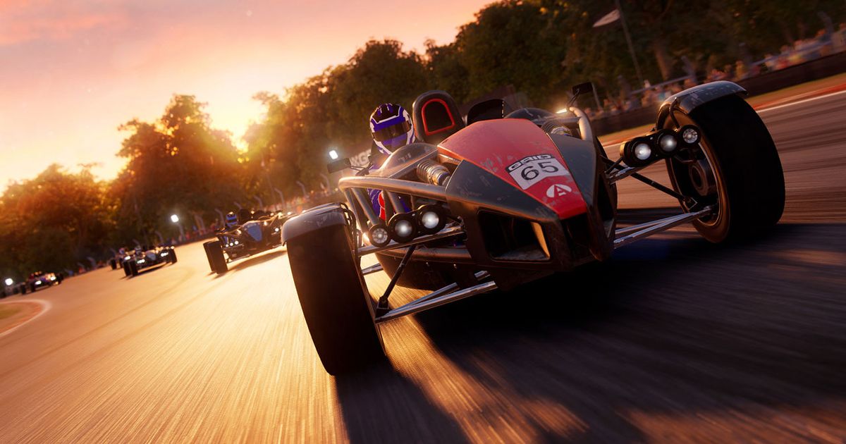 GRID Legends in-game image of a black and red Ariel Atom sports car racing ahead of others on track.