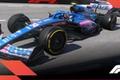 In-game image from F1 22 of the bright blue and pink Alphine F1 car.