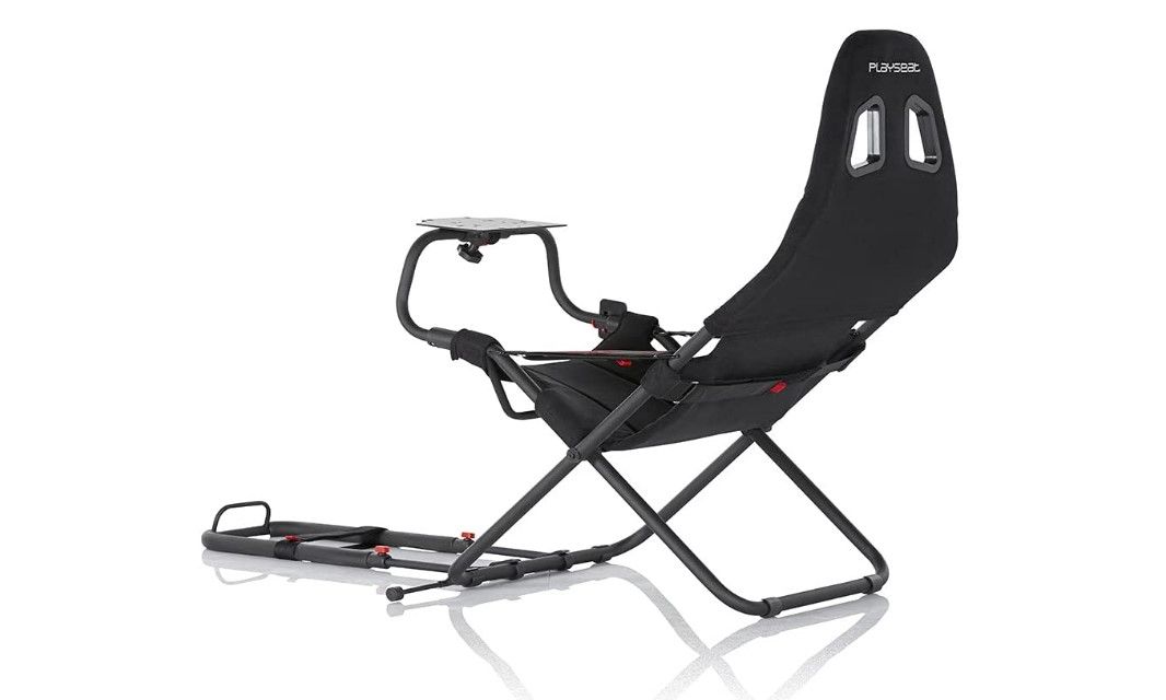 Best racing seat for F1 22 Playseat product image of a black racing cockpit with subtle red details.