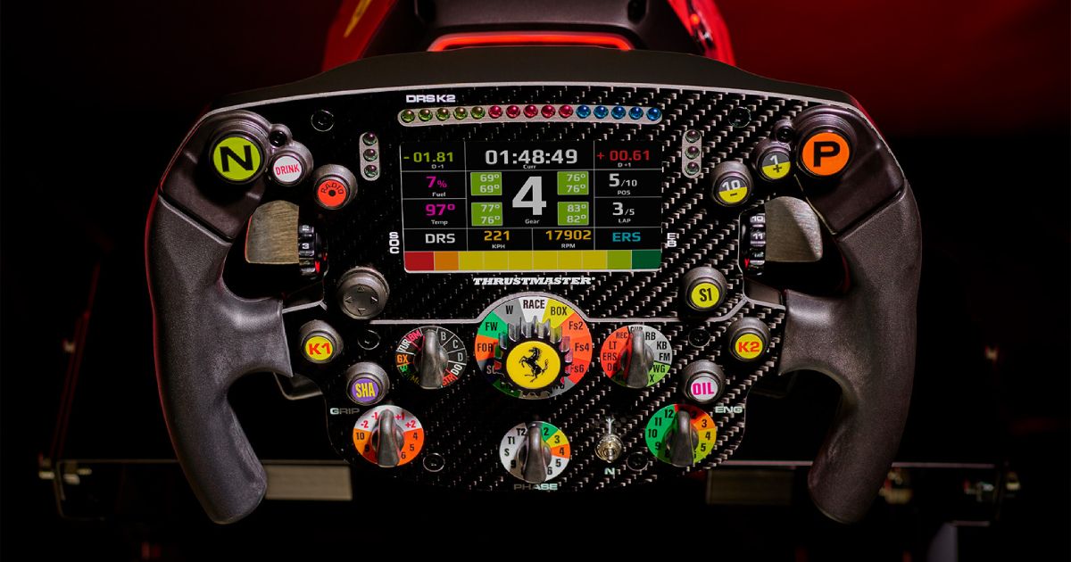 A black F1-style racing wheel connected to a red and black wheel base. The wheel itself features a slew of extra buttons as well as Ferarri branding.