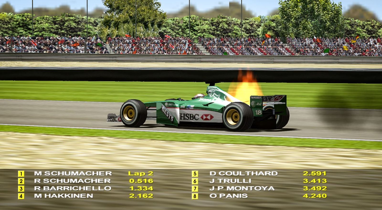 A Jaguar F1 car on fire in the game Grand Prix 4