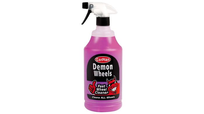 Best alloy wheel cleaner CarPlan product image of a clear spray bottle containing a pink cleaning product, plus black and red labels.