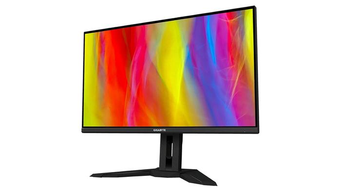 Best monitor for F1 23 - Gigabyte M32U product image of a black monitor with yellow, red, pink, purple, and blue streaks across the display.