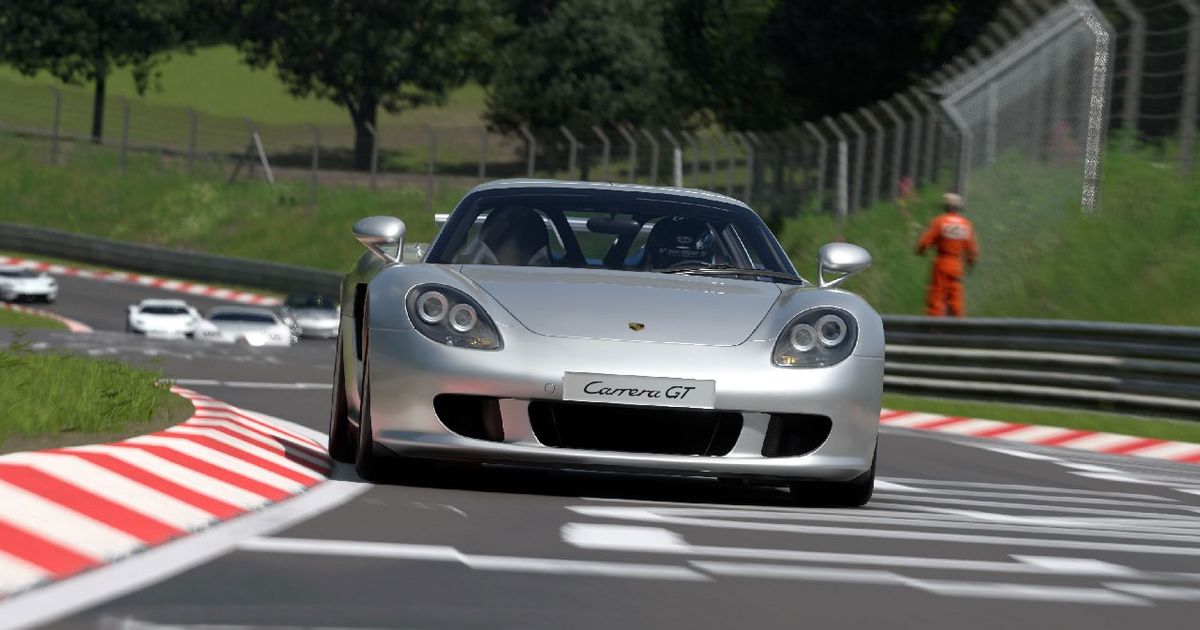 Gran Turismo 7 in-game image of a silver Porsche driving on a track.