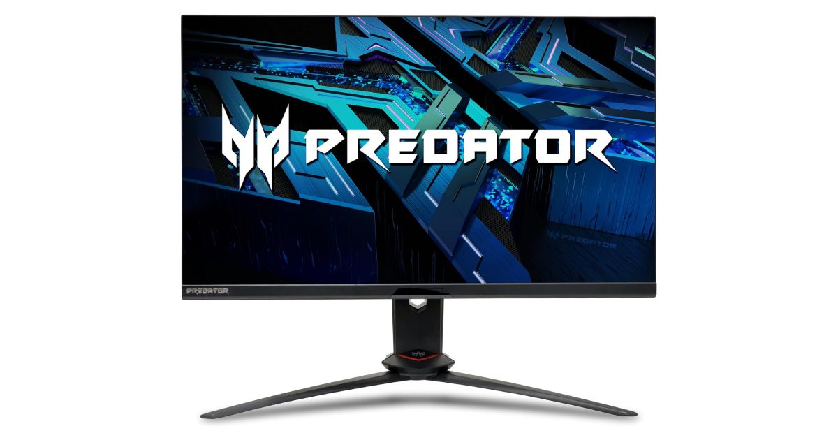 Acer Predator XB273U Fbmiiprzx product image of a black near-frameless monitor with red trim and white Predator branding on the display in front of a dark blue and green background.